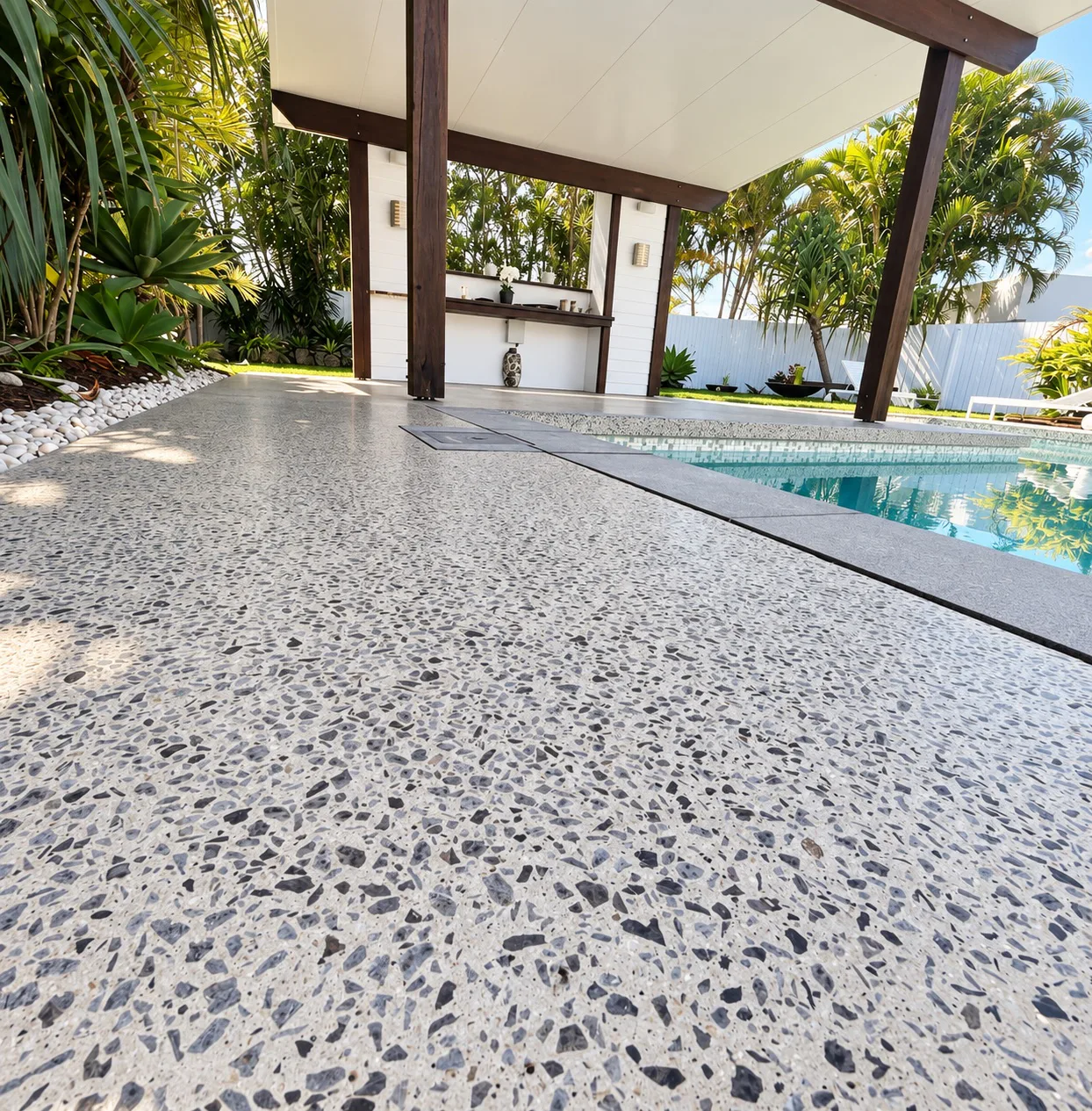 External honed and sealed concrete pool surround in Brisbane
